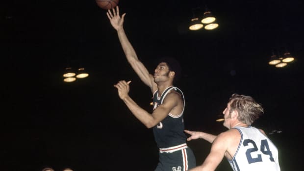 Milwaukee Bucks center Lew Alcindor later known as Kareem Abdul-Jabbar in action against the Cincinnati Royals 